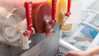 Elderly man mistakes frozen drink machine for hand-sanitizing station, washes up with red drink