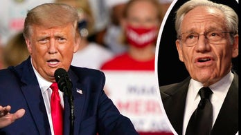 Trump slams Woodward, tells Hannity he didn't want to 'scare people' about virus