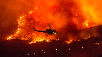 California firefighters overtaken by flames, high winds fan wildfires throughout the Northwest