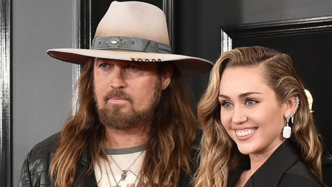 Miley Cyrus says dad Billy Ray Cyrus is to blame for head injury at age 2