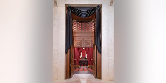 The Courtroom doors draped in black following the death of Supreme Court Associate Justice Ruth Bader Ginsburg, Sept. 18, 2020. (Fred Schilling/US Supreme Court)