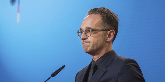 FILE-In this Sept. 2, 2020 file photo German Foreign Minister Heiko Maas attends a press conference at the Foreign Ministry in Berlin, Germany. Germany is increasing pressure on Russia over the poisoning of Russian opposition politician Alexei Navalny, warning that a lack of support by Moscow in the investigation could “force” Germany to rethink the fate of a German-Russian pipeline project. (Stefanie Loos/Pool via AP)