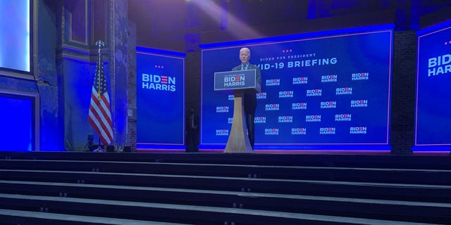 Democratic presidential nominee Joe Biden takes questions from reporters in Wilmington, Delaware, after sitting down for a coronanvirus pandemic briefing with his team of health experts, on Sept. 16, 2020.