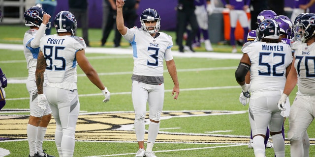 Tennessee Titans kicker Stephen Gostkowski (3) celebrates after kicking a 55-yard field goal during the second half of an NFL football game against the Minnesota Vikings, Sunday, Sept. 27, 2020, in Minneapolis. The Titans won 31-30. (AP Photo/Bruce Kluckhohn)