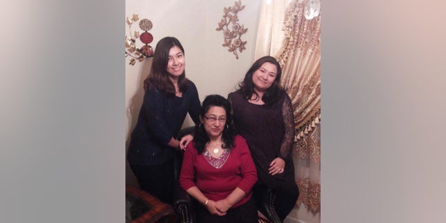 Happier times: Murat (right) and her sister Zamira (left) with their mother Dr. Gulshan Abbas, before she "disappeared" in the Muslim-majority Xinjiang region of China in 2018.