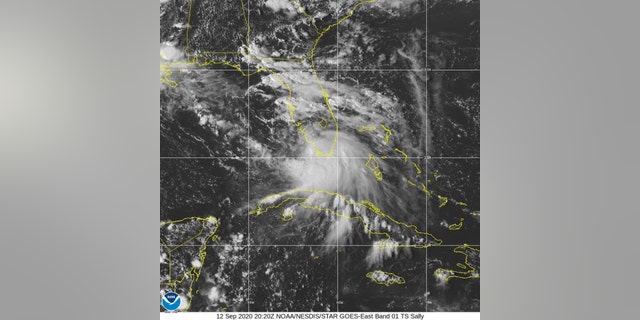 This Saturday, Sept. 12, 2020 image provided by NOAA shows the formation of Tropical Storm Sally. Tropical Storm Sally has formed off south Florida, becoming the earliest 18th-named tropical storm on record in a busy Atlantic hurricane season.