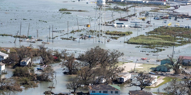 Water covers land after the passage of Hurricane Laura, Thursday Aug. 27, 2020, in Cameron, La. (Bill Feig/The Advocate via AP, Pool)