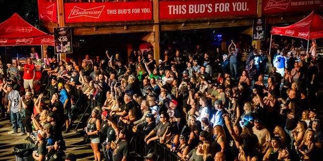 In this Aug. 14, file photo fans attend a performance by Saul at the Iron Horse Saloon during the 80th annual Sturgis Motorcycle Rally, in Sturgis, S.D. (Amy Harris/Invision/AP, File)