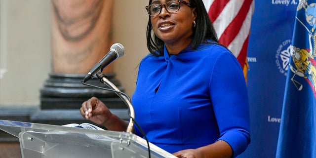Rochester Mayor Lovely Warren, left, speaks to the media during a press conference in Rochester, N.Y., last week where she announced the suspension of officers involved in the death of Daniel Prude. (AP Photo/Adrian Kraus)
