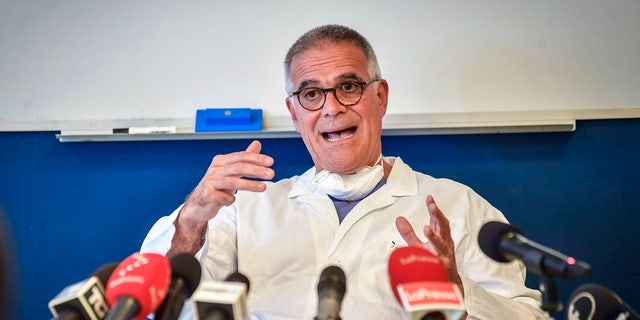 Alberto Zangrillo, Silvio Berlusconi's longtime physician, talks to reporters at the San Raffaele hospital in Milan, Friday, Sept. 4, 2020.  (Claudio Furlan/LaPresse via AP)