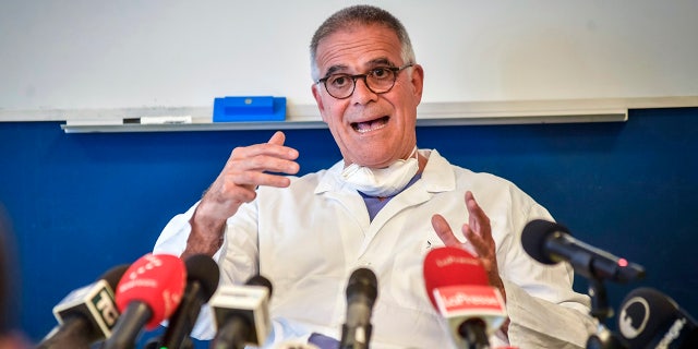 Alberto Zangrillo, Silvio Berlusconi's longtime physician, talks to reporters at the San Raffaele hospital in Milan, Friday, Sept. 4, 2020.  (Claudio Furlan/LaPresse via AP)