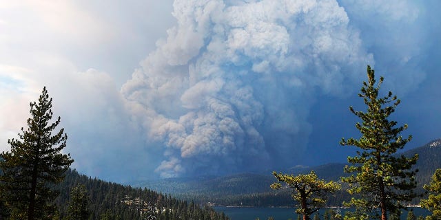 Plumes of smoke rise into the sky as a wildfire burns on the hills near Shaver Lake, Calif., Saturday, Sept. 5, 2020. (Associated Press)