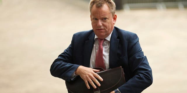FILE - In this file photo dated Monday, Oct. 7, 2019, United Kingdom's Brexit adviser David Frost arrives at EU headquarters for a technical meeting on Brexit, in Brussels. (AP Photo/Francisco Seco, FILE)
