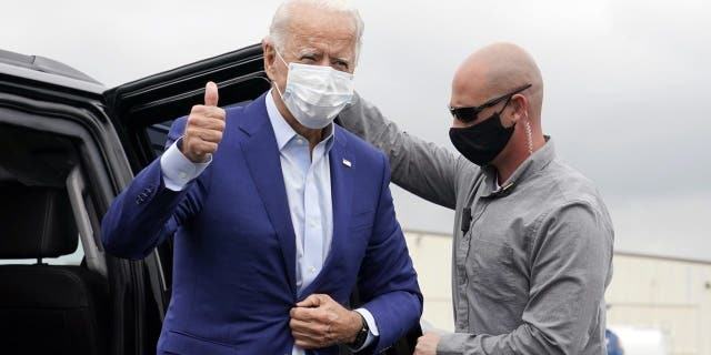 Democratic presidential candidate former Vice President Joe Biden arrives to board a plane at New Castle Airport in New Castle, Del., Wednesday, Sept. 9, 2020, en route to campaign events in Michigan. (AP Photo/Patrick Semansky)