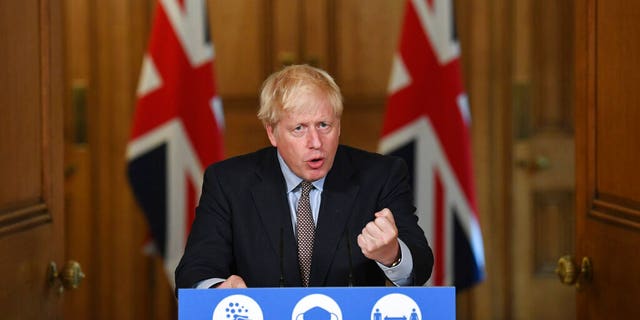 Britain's Prime Minister Boris Johnson speaks during a virtual press conference at Downing Street, London, Wednesday Sept. 9, 2020. (Stefan Rousseau/Pool via AP)