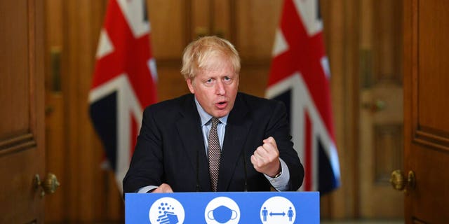 positive news Britain's Prime Minister Boris Johnson speaks during a virtual press conference at Downing Street, London, Wednesday Sept. 9, 2020, following the announcement that the legal limit on social gatherings is set to be reduced from 30 people to six. (Stefan Rousseau/Pool via AP)