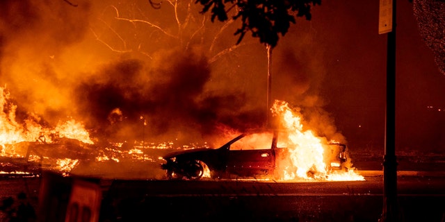 This photo taken by Talent, Ore., resident Kevin Jantzer shows the destruction of his hometown as wildfires ravaged the central Oregon town near Medford late Sept. 8. (Kevin Jantzer via AP)
