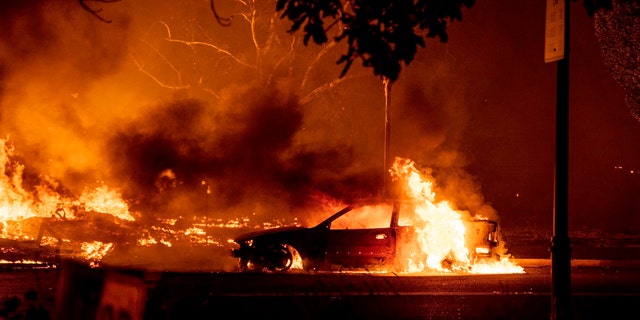 This photo taken by Talent, Ore., resident Kevin Jantzer shows the destruction of his hometown as wildfires ravaged the central Oregon town near Medford late Sept. 8. (Kevin Jantzer via AP)