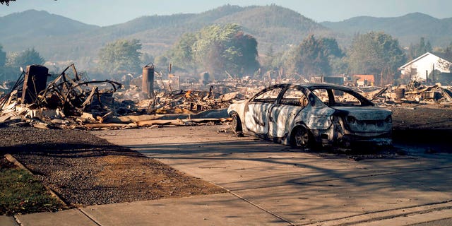 This photo taken by Talent, Ore., resident Kevin Jantzer shows the destruction of his hometown in the aftermath of wildfires that ravaged the central Oregon town near Medford, Sept. 9. (Kevin Jantzer via AP)