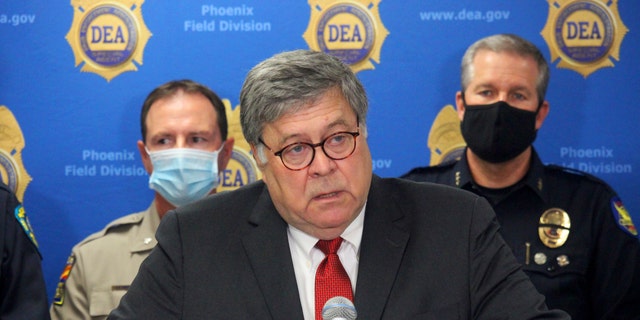 U.S. Attorney General William Barr speaks at a news conference, Thursday, Sept. 10, 2020, in Phoenix, where he announced results of a crackdown on international drug trafficking. (Associated Press)