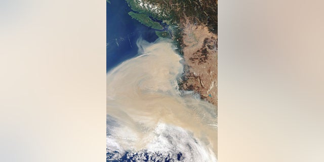 In this Thursday Copernicus Sentinel-3 image, provided by the European Space Agency, ESA, multiple fires can be seen hovering over the U.S. states of California, Washington and Oregon. In the top of the image, the cities of Vancouver and Seattle are visible. (ESA, CC BY-SA IGO 3.0 via AP)