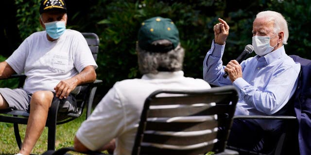 In this Sept. 7, 2020, file photo Democratic presidential candidate former Vice President Joe Biden speaks during an event with local union members in the backyard of a home in Lancaster, Pa. (AP Photo/Carolyn Kaster, File)