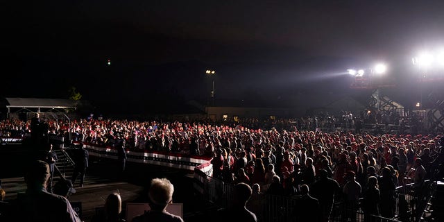 A crowd listens as President Donald Trump speaks at a rally at Minden-Tahoe Airport in Minden, Nev., Saturday, Sept. 12, 2020. (Associated Press)