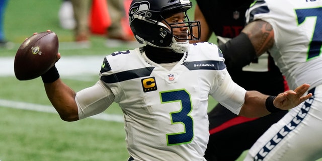 Seattle Seahawks quarterback Russell Wilson (3) works in the p[ocket against the Atlanta Falcons during the first half of an NFL football game, Sunday, Sept. 13, 2020, in Atlanta. (AP Photo/Brynn Anderson)