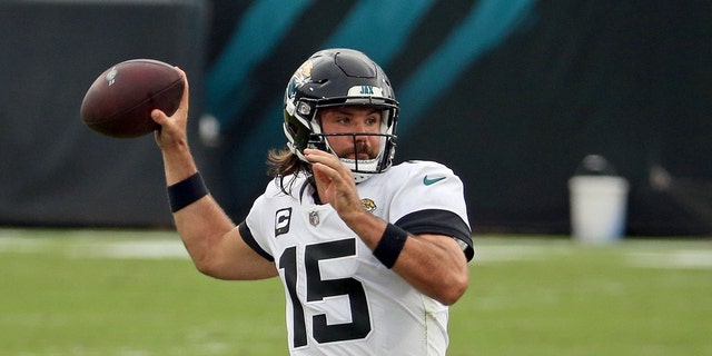 Jacksonville Jaguars quarterback Gardner Minshew (15) throws a pass against the Indianapolis Colts during the first half of an NFL football game, Sunday, Sept. 13, 2020, in Jacksonville, Fla. (AP Photo/Stephen B. Morton)