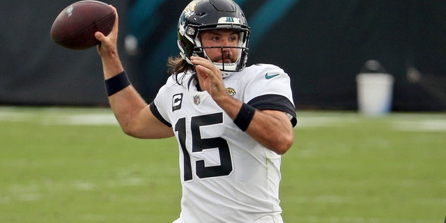 Jacksonville Jaguars quarterback Gardner Minshew (15) throws a pass against the Indianapolis Colts during the first half of an NFL football game, Sunday, Sept. 13, 2020, in Jacksonville, Fla. (AP Photo/Stephen B. Morton)