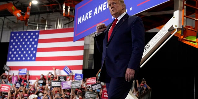 President Donald Trump arrives to speak at a rally at Xtreme Manufacturing, Sunday, Sept. 13, 2020, in Henderson, Nev. (AP Photo/Andrew Harnik)