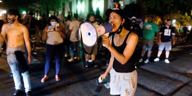 Black Lives Matter protesters block West Chestnut Street at North Prince Street near the Lancaster city police station on Sunday, Sept. 13, 2020. Blaine Shahan, LNP/LancasterOnline via AP)