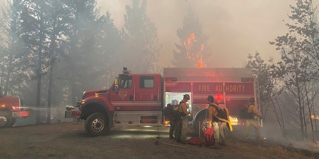 This photo provided by the Unified Fire Authority shows Utah fire crews prepare to fight wildfires near Butte Falls in southern Oregon on Saturday, Sept. 12, 2020. (Matthew McFarland/Unified Fire Authority via AP)