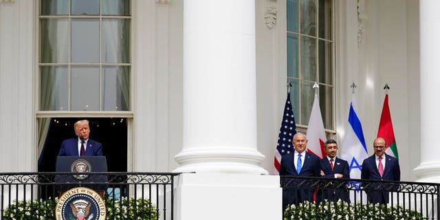 President Donald Trump speaks during the Abraham Accords signing ceremony on the South Lawn of the White House, Tuesday, Sept. 15, 2020, in Washington, as Israeli Prime Minister Benjamin Netanyahu, United Arab Emirates Foreign Minister Abdullah bin Zayed al-Nahyan and Bahrain Foreign Minister Khalid bin Ahmed Al Khalifa, look on. (AP Photo/Alex Brandon)