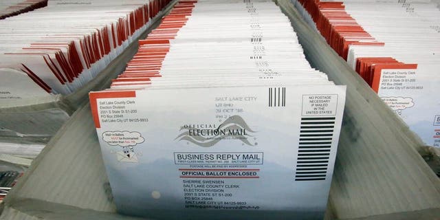 President Trump and many of his Republican allies have said mail voting is vulnerable to fraud, as Democrats condemn the suggestion. (AP Photo/Rick Bowmer, File)