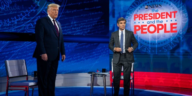 President Trump talks with ABC News anchor George Stephanopoulos before a town hall at National Constitution Center, Sept. 15, 2020, in Philadelphia. (Associated Press)
