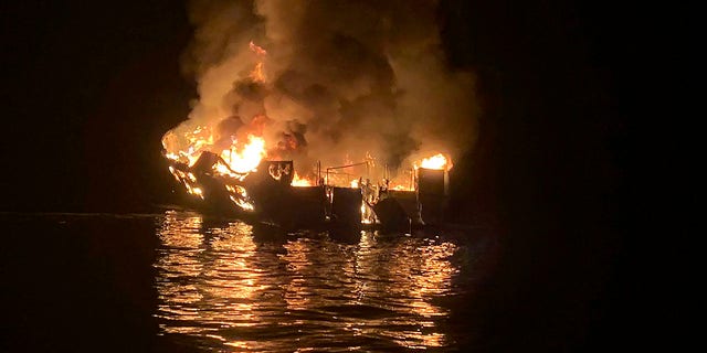 The Conception is engulfed in flames after a deadly fire broke out aboard the commercial scuba diving vessel off the Southern California Coast. The crew aboard a Southern California scuba dive boat had not been trained on emergency procedures before the deadly fire broke out last year, killing 34 people in one of the state's deadliest maritime disasters, according to federal documents released Wednesday, Sept. 16, 2020. (Santa Barbara County Fire Department via AP, File)