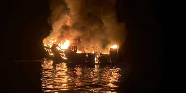 The Conception is engulfed in flames after a deadly fire broke out aboard the commercial scuba diving vessel off the Southern California Coast. The crew aboard a Southern California scuba dive boat had not been trained on emergency procedures before the deadly fire broke out last year, killing 34 people in one of the state's deadliest maritime disasters, according to federal documents released Wednesday, Sept. 16, 2020. (Santa Barbara County Fire Department via AP, File)