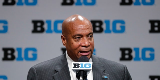 FILE - In this March 12, 2020 file photo, Big Ten commissioner Kevin Warren addresses the media in Indianapolis.  The Big Ten's plan to play football this fall includes trying to save lives in the future.  The conference announced on Wednesday, September 16, 2020, that it would have a football season this fall.  The Big Ten is establishing a cardiac registry to study the effects COVID-19 has on the hearts of student-athletes.  Big Ten Commissioner Kevin Warren said he will help all students, the surrounding communities and the entire nation. 
