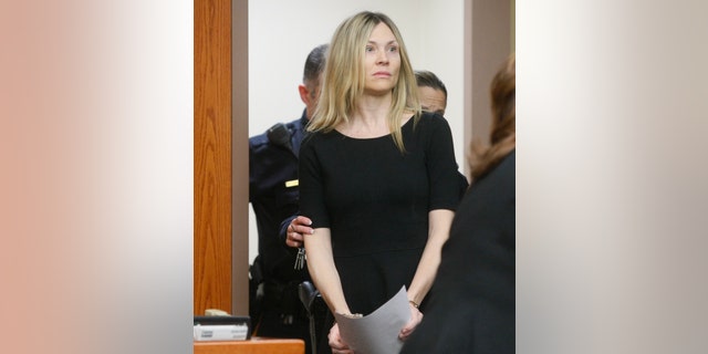 Amy Locane enters the courtroom to be sentenced in Somerville, N.J. The former "Melrose Place" actress who has already served a prison sentence for a fatal 2010 drunk driving crash in New Jersey is headed back behind bars. 