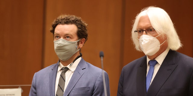 Actor Danny Masterson, left, stands with his attorney, Thomas Mesereau as he is arraigned on rape charges at Los Angeles Superior Court, in Los Angeles, Calif. on Friday, Sept. 18, 2020.