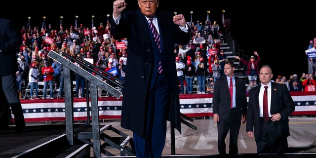 President Donald Trump dances as he walks off stage after speaking during a campaign rally at Bemidji Regional Airport, Friday, Sept. 18, 2020, in Bemidji, Minn. (AP Photo/Evan Vucci)