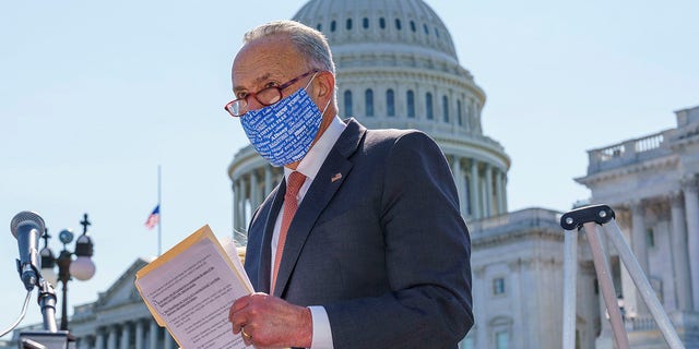Senate Minority Leader Chuck Schumer, D-N.Y., holds a media briefing on the Supreme Court vacancy created by the death of Justice Ruth Bader Ginsburg, outside the Capitol in Washington, Tuesday, Sept. 22, 2020. (Associated Press)