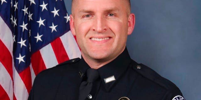 FILE - This undated file photo provided by the Louisville Metro Police Department shows officer Brett Hankison. A Kentucky grand jury on Wednesday, Sept. 23, 2020, indicted the former police officer for shooting into neighboring apartments but did not move forward with charges against any officers for their role in Breonna Taylor’s death. The jury announced that fired Officer Brett Hankison was charged with three counts of wanton endangerment in connection to the police raid of Taylor's home on the night of March 13. (Louisville Metro Police Department via AP, File)