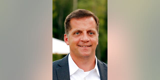 FILE - In this Aug. 21, 2020, file photo, Republican Daniel Gade, who is running against Sen. Mark Warner, D-Va., holds a gathering at Hardywood Brewery in Richmond, Va. Gade and Warner participated in a debate Wednesday, Sept. 23, 2020, in Northern Virginia. (Joe Mahoney/Richmond Times-Dispatch via AP)