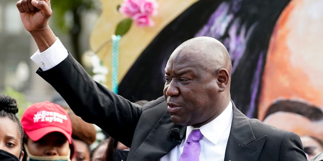 Breonna Taylor family attorney Ben Crump, center speaks during a news conference, Friday, Sept. 25, 2020, in Louisville, Ky. (AP Photo/Darron Cummings)