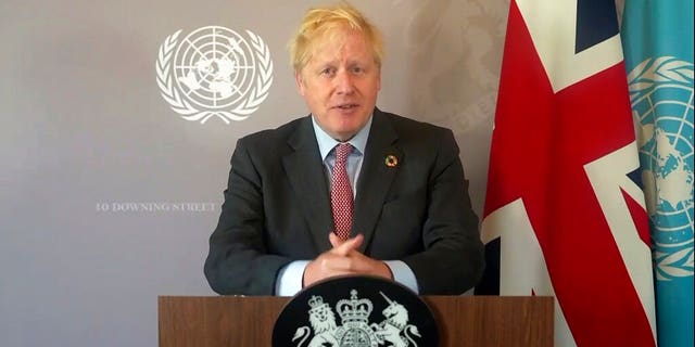 In this photo made from UNTV video, British Prime Minister Boris Johnson speaks in a pre-recorded message which was played during the 75th session of the United Nations General Assembly, Saturday, Sept. 26, 2020, at UN Headquarters. (UNTV Via AP )
