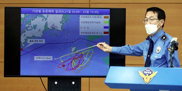 Yoon Seong-hyun, head of the Korea Coast Guard's investigation bureau, speaks during a briefing at the agency in Incheon, South Korea, Tuesday, Sept. 29, 2020. South Korea said Tuesday that a government official slain by North Korean sailors wanted to defect, concluding that the man, who had gambling debts, swam against unfavorable currents with the help of a life jacket and a floatation device and conveyed his intention of resettling in North Korea. (Yun Hyun-tae/Yonhap via AP)