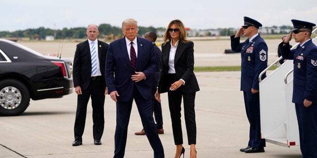 Donald Trump President Donald Trump and first lady Melania Trump arrive at Cleveland Hopkins International Airport for the first presidential debate, Tuesday, Sept. 29, 2020, in Cleveland. (AP Photo/Evan Vucci)