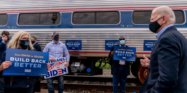 Democratic presidential candidate former Vice President Joe Biden speaks to supporters before boarding his train at Amtrak's Cleveland Lakefront train station, Wednesday, Sept. 30, 2020, in Cleveland, Biden is on a train tour through Ohio and Pennsylvania today. (AP Photo/Andrew Harnik)